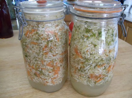 Fermentation causes veggies to float to the top of the jar. Fermentation causes veggies to float to the top of the jar.