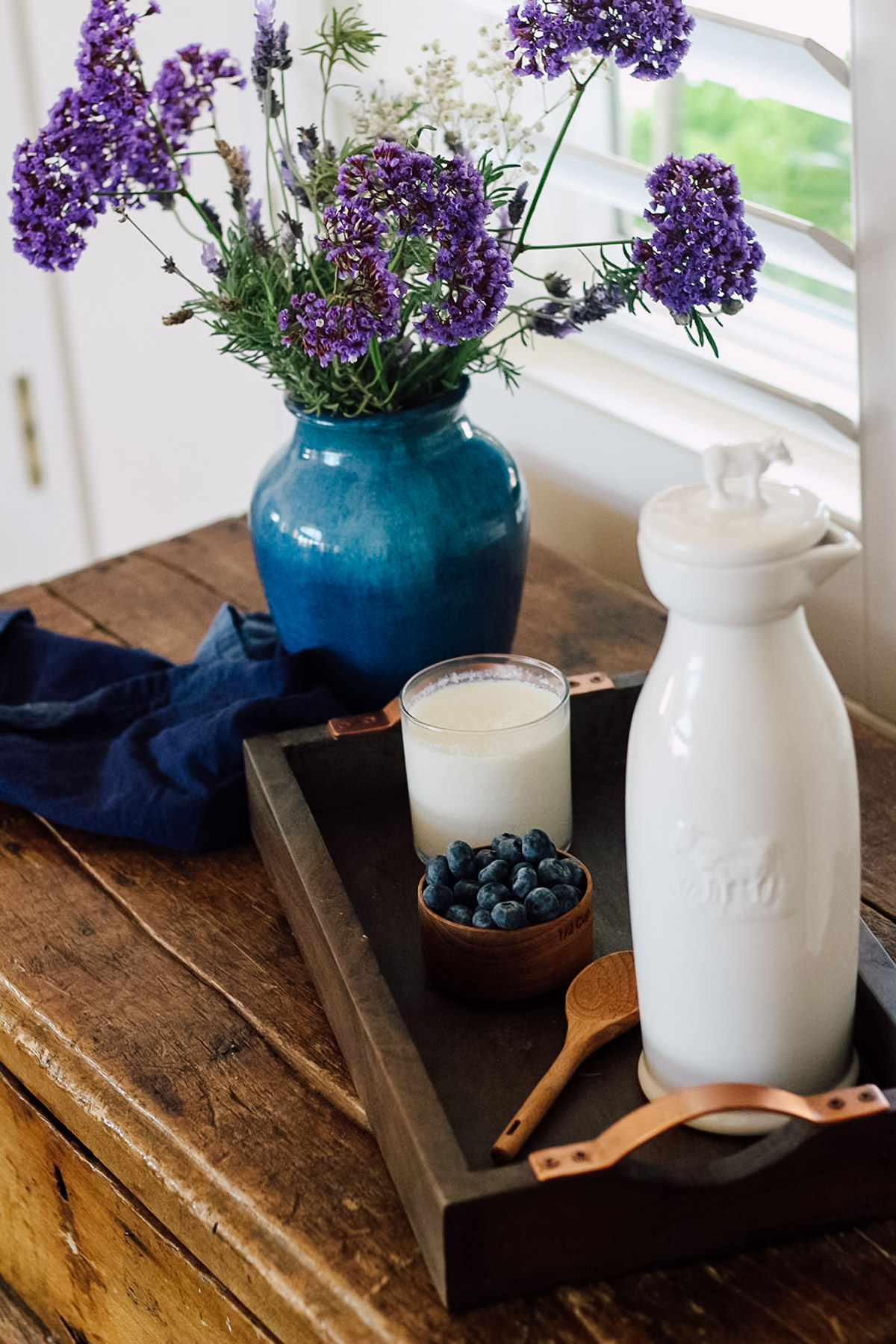 Kefir next to blueberries