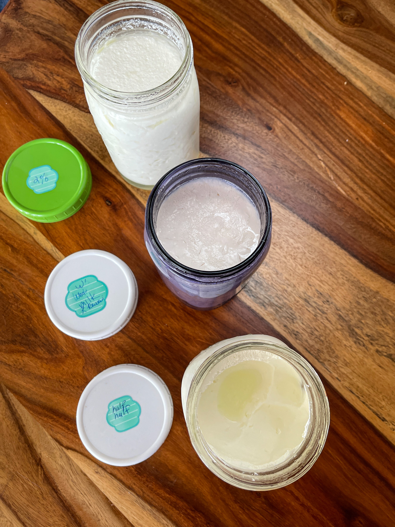 Left to right 2% whole milk, half and half-2 Left to right 2% whole milk, half and half-2